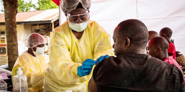 File photo of a health worker vaccinates a man against the Ebola virus in Beni, eastern Democratic Republic of the Congo. — courtesy World Bank/Vincent Tremeau