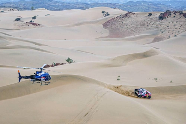 Keen action in the 2021 Saudi Dakar Rally with Stéphane Peterhansel in the lead from Nasser Al-Attiyah.