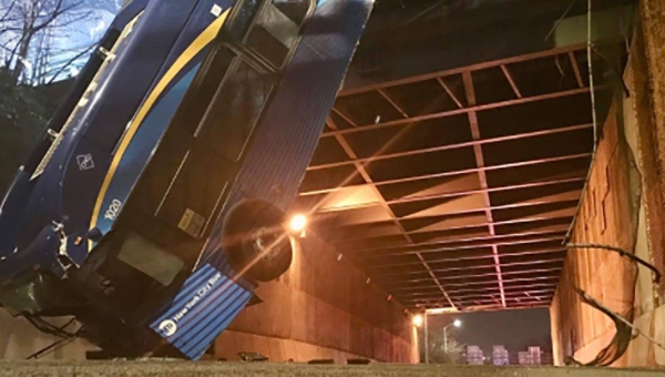 At least seven people, including the bus driver, were injured after a bus crashed through an overpass barrier in New York City's Bronx area. — Courtesy photo