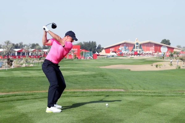 Rory McIlroy of Northern Ireland tees off on the 9th hole during Day One of the Abu Dhabi HSBC Championship at Abu Dhabi Golf Club on Thursday in Abu Dhabi, United Arab Emirates. (Photo by Warren Little)