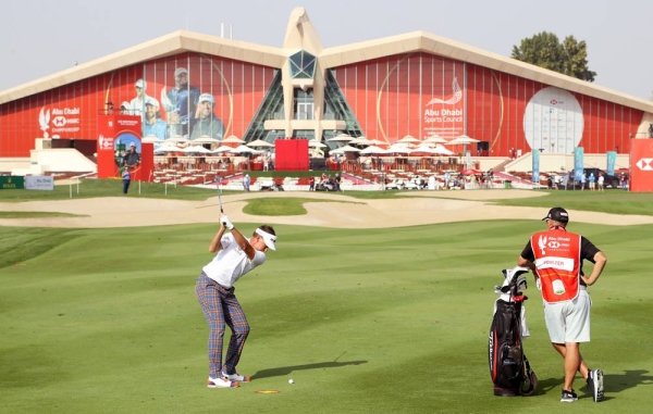 Detailed view of the shoes of Justin Thomas of the United States of America featuring a campaign for 'World NTD day' as he putts during Day One of the Abu Dhabi HSBC Championship at Abu Dhabi Golf Club on Thursday in Abu Dhabi, United Arab Emirates. (Photo by Andrew Redington)