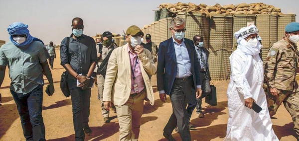 
UN peacekeeping chief Jean-Pierre Lacroix, in center with sunglasses, visited Ménaka, Mali, where he met with the governor, president of the Interim Authority, armed groups signatories to the peace agreement, civil society and the local commander, among others. — courtesy MINUSMA