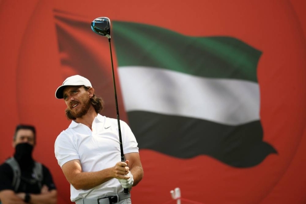 Rory McIlroy of Northern Ireland and Tyrrell Hatton of England walk on the 18th hole during Day Three of the Abu Dhabi HSBC Championship at Abu Dhabi Golf Club on Saturday in Abu Dhabi, United Arab Emirates. (Photo by Ross Kinnaird)