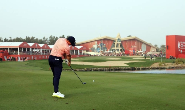 Rory McIlroy of Northern Ireland and Tyrrell Hatton of England walk on the 18th hole during Day Three of the Abu Dhabi HSBC Championship at Abu Dhabi Golf Club on Saturday in Abu Dhabi, United Arab Emirates. (Photo by Ross Kinnaird)