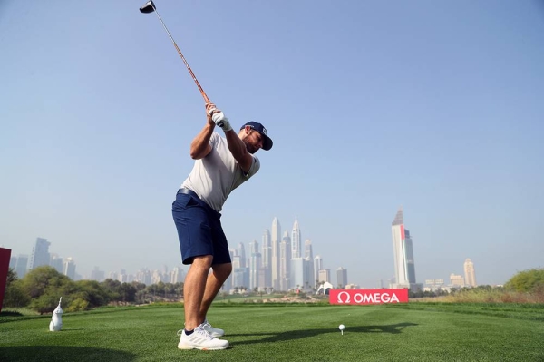 Tyrrell Hatton of England tees off on the eighth hole during the pro am ahead of the Omega Dubai Desert Classic at Emirates Golf Club on Tuesday in Dubai, United Arab Emirates. (Photo by Warren Little)