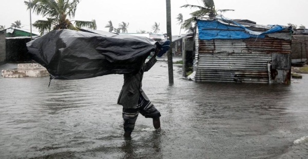 A man stands amidst debris after Tropical Cyclone Eloise barreled through Mozambique, leaving massive destruction in its wake. — courtesy UNICEF/Ricardo Franco