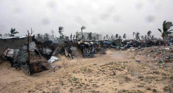 A man stands amidst debris after Tropical Cyclone Eloise barreled through Mozambique, leaving massive destruction in its wake. — courtesy UNICEF/Ricardo Franco