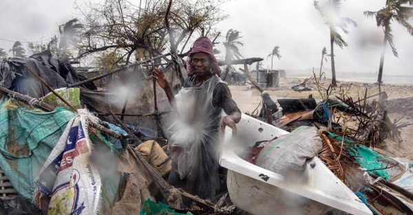 A man stands amidst debris after Tropical Cyclone Eloise barreled through Mozambique, leaving massive destruction in its wake. — courtesy UNICEF/Ricardo Franco