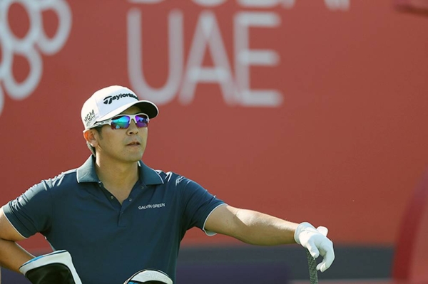 Richard Sterne of South Africa plays his second shot on the second during Day One of the Omega Dubai Desert Classic at Emirates Golf Club on Thursday in Dubai, United Arab Emirates. (Photo by Warren Little)