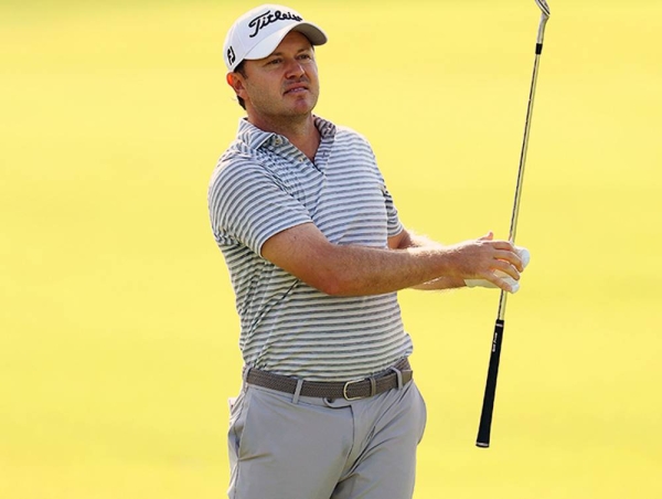 Richard Sterne of South Africa plays his second shot on the second during Day One of the Omega Dubai Desert Classic at Emirates Golf Club on Thursday in Dubai, United Arab Emirates. (Photo by Warren Little)