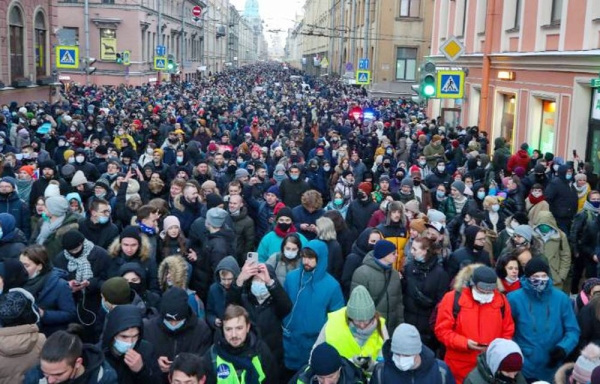 People take part in an unauthorized rally in support of Alexey Navalny in St. Petersburg on Sunday. — courtesy CNN
