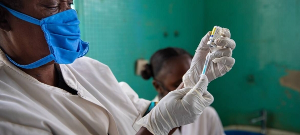 A health worker at a local health center in Kinshasa, Democratic Republic of the Congo, prepares a vaccine injection in this file picture. 
