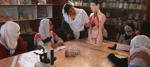 As part of the World Bank's Education Quality Improvement Program, students study biology at Sofia Amma Jan Girl's School in the Kandahar province of Afghanistan. — Courtesy photos
