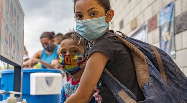 The UN Population Fund helps Venezuelan migrants at the Tienditas Health Care Center in Colombia. — courtesy PAHO/Karen González