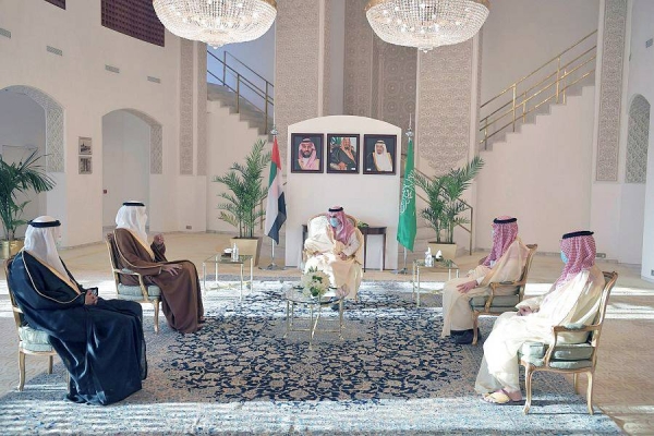 Minister of Foreign Affairs Prince Faisal Bin Farhan presented here Monday King Abdulaziz Second Class Scarf to Sheikh Shakhbout Bin Nahyan Bin Mubarak Al Nahyan.