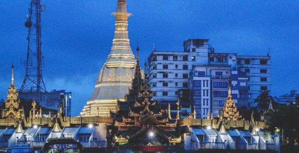 A pagoda at dawn in downtown Yangon, the commercial hub of Myanmar. — courtesy Unsplash/Kyle Petzer