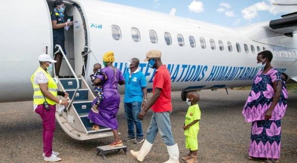 

Refugees from Burundi prepare to board a flight back home in December 2020. — courtesy UNHCR/Samuel Otieno