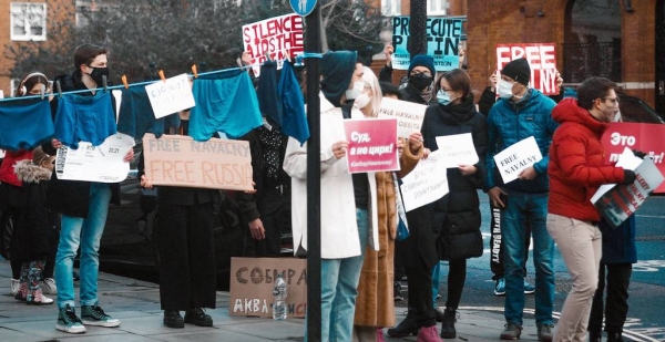 A demonstration in support of Aleksei Navalny takes place in London, UK in early 2021. — courtesy Unsplash/Liza Pooor
