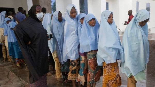 At least one person has been shot dead and two others injured as hundreds of kidnapped Nigerian schoolgirls who had been released were reunited with their parents, eyewitnesses said. — Courtesy photo