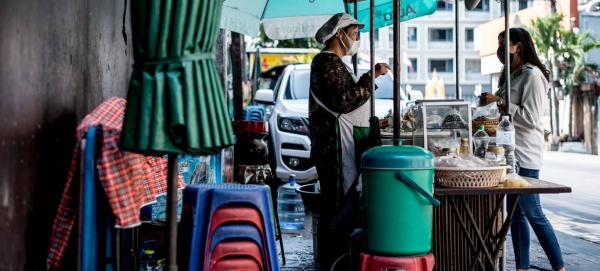 Many women street food vendors, like the one pictured in Bangkok, Thailand, lost their only source of income when coronavirus-related lockdowns shuttered towns and cities. — Courtesy file photo