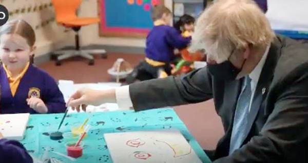 British Prime Minister Boris Johnson shares some moments with schoolchildren of the St Mary’s Church of England Primary School in Stoke-on-Trent on Saturday.