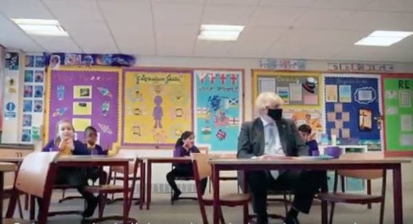 British Prime Minister Boris Johnson shares some moments with schoolchildren of the St Mary’s Church of England Primary School in Stoke-on-Trent on Saturday.