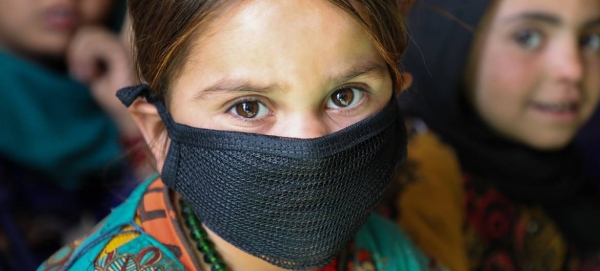 A five-year-old child is seen at a community-based education center in an IDP camp in Herat province, Afghanistan, in this file courtesy photo.