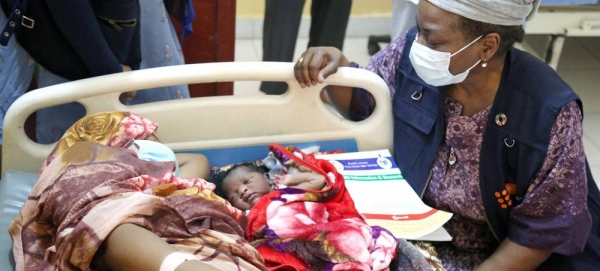 UNFPA Executive Director Natalia Kanem (right) visits a mother and baby at a hospital maternity ward in Sudan’s Blue Nile state. — courtesy Sufian Abdul-Mouty/UNFPA Sudan