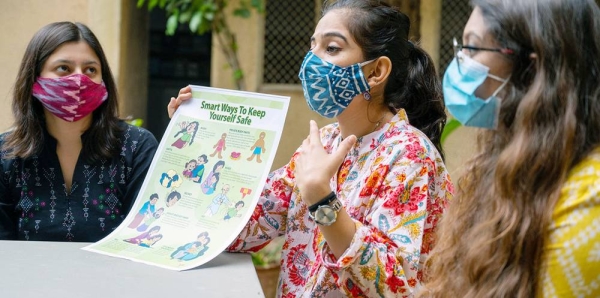 Young women in India discuss gender-based violence. — courtesy UNICEF/Vinay Panjwani