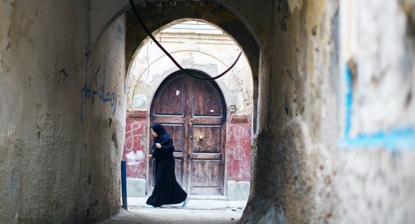 File photo shows a woman walking in the old city of Tripoli, Libya. — courtesy UNSMIL/Lason Athanasiadis
