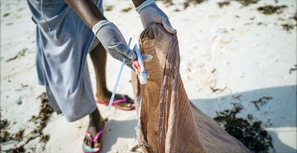 Litter is removed from a beach in Watamu in Kenya. — courtesy UNEP/Duncan Moore
