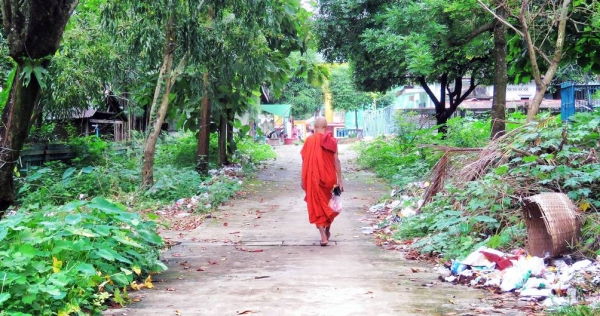 File photo shows two women pray at a temple in Yangon, Myanmar. — courtesy Unsplash/Matteo Massimi
