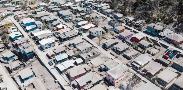 Ash from the eruptions of the La Soufrière volcano covers a town in St Vincent and the Grenadines. — courtesy Bajanpro.