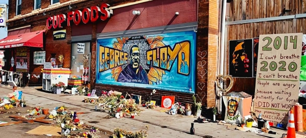 Tributes are left for George Floyd outside the grocery store in the US state of Minnesota where he was murdered by a police officer in this file courtesy photo.
