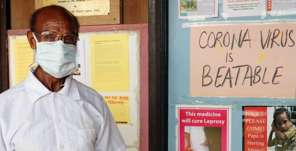 A healthcare worker at the Rumginae Hospital which serves communities in North Fly District, in the Western Province of Papua New Guinea. — courtesy UN Papua New Guinea/Rachel Donovan