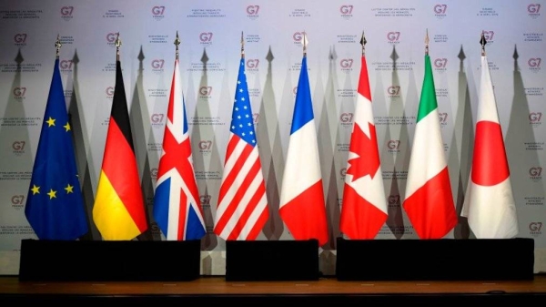Flags of the European Union, Germany, the United Kingdom, the United States, France, Canada, Italy and Japan are seen in this file courtesy photo.