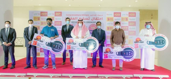 Riyadh wInners in the LuLu anniversary promotion. It awarded 16 winners of brand-new Mini Cooper cars.