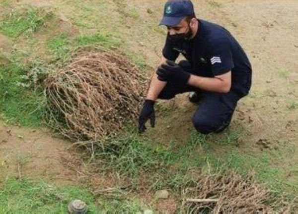 Civil Defense in Jazan dismantles mine washed away by flooding from Yemen