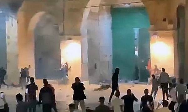 A video grab of clashes between Israeli police and Palestinian protesters outside Jerusalem's Old City during the holiest night of Ramadan, according to the Palestinian Red Crescent. — courtesy Twitter