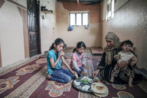 


WFP provides poor and food insecure families in Gaza with electronic food vouchers which give them access to nutritious local products such as eggs and yoghurt in selected retail shops. — courtesy WFP/Wissam Nassar