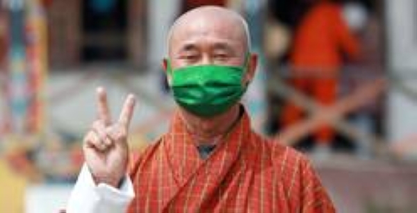 

Ap Reiki, a local leader shows the V for vaccinated sign after receiving the COVID-19 vaccine in Dagana district, Bhutan. — courtesy UNICEF Bhutan/Tshering