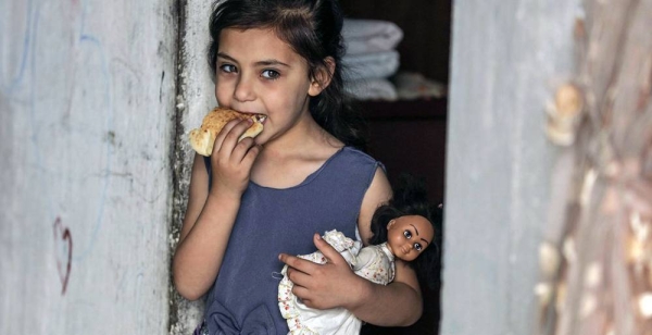  

The World Food Program provides poor and food insecure families in Gaza with electronic food vouchers which give them access to local products (file photo). — courtesy WFP/Wissam Nassar