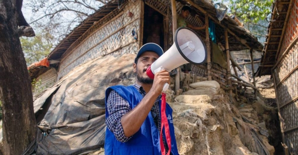 Mohammad Alam, a Rohingya refugee, has been working with IOM to keep his community informed following the fire at Cox's Bazar. — courtesy IOM/Mashrif Abdullah Al