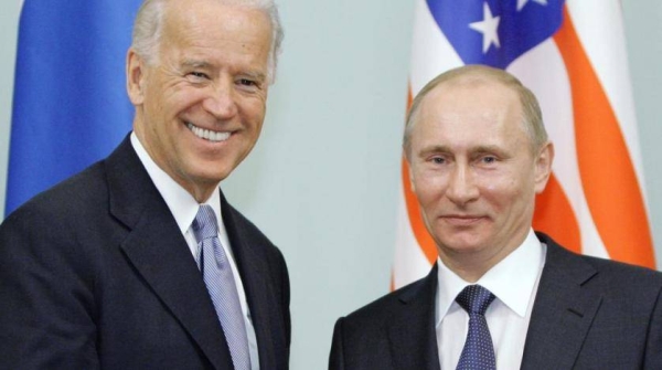 US President Joe Biden, left, is seen with his Russian counterpart Vladimir Putin in this file courtesy photo. 