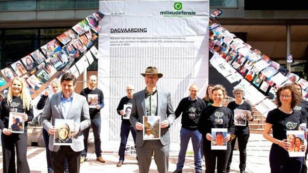 The campaigners outside the court in The Hague. — courtesy Milieudefensie