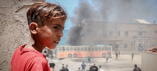 A Palestinian child in front of the Gaza port, which was damaged during the recent escalation. — Courtesy file photo
