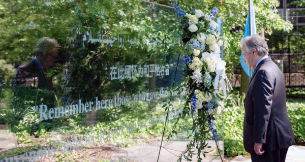 Secretary-General António Guterres attends the wreath-laying ceremony to Commemorate International Day of UN Peacekeepers 2021. — courtesy UN Photo/Mark Garten