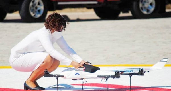 A nurse places a cargo of medical supplies in a drone before take-off. — courtesy UNFPA Botswana