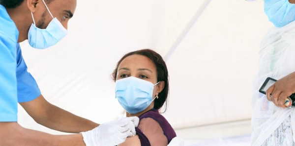 A doctor receives a COVID-19 vaccination at Eka Kotebe Hospital in Ethiopia. — courtesy UNICEF/Nahom Tesfaye
