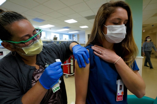 Britain's health minister has urged young people to come forward when invited to receive their COVID-19 vaccinations as jabs open up to people over the age of 25 this week. — Courtesy file photo